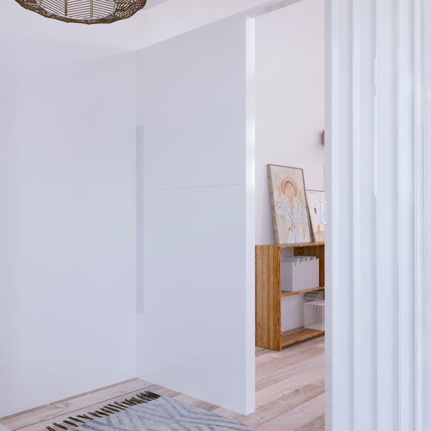 detail image of wall mounting bracket on a modern partition wall with Scandinavian furniture and maple hardwood floors