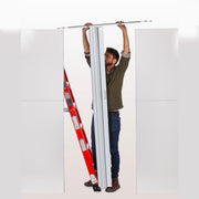man installing accordion door on top of everpanel modular wall divider system